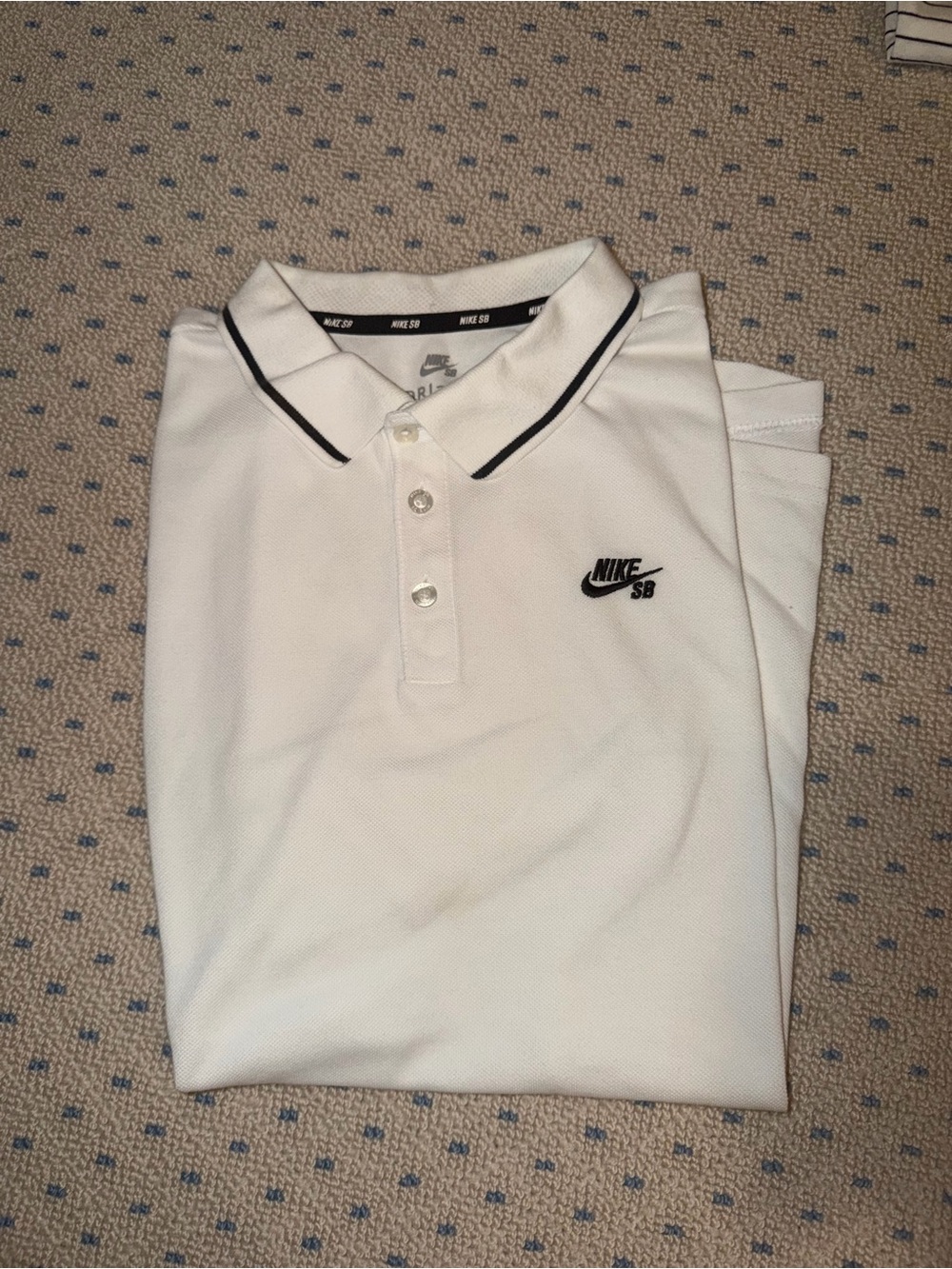 Nike SB White Polo with Black Trim and Embroidered Logo